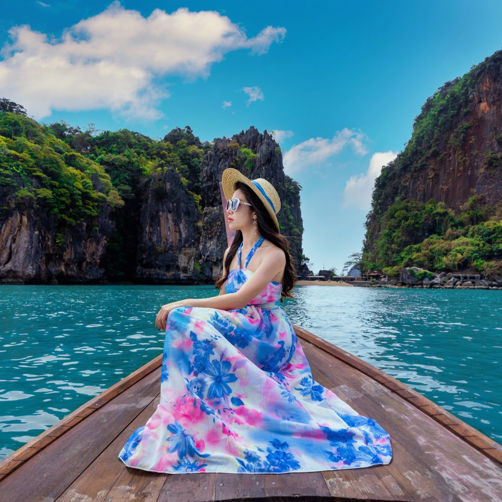 Phuket Tours Online Expat Run Phuket Tour Agency Beautiful Girl Sitting On The Boat At James Bond Island In Phang